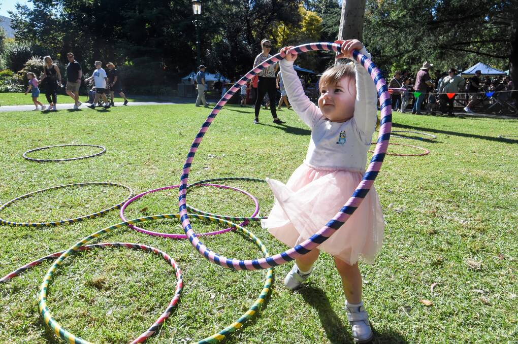 HULA HOOP: There was no way kids would get bored in Rosalind Park on Saturday. Picture: DARREN HOWE