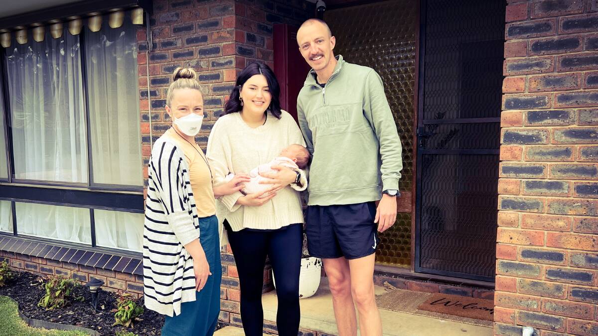 Home visit by midwife Rhiannan Haintz with Chloe Wardlaw, her partner Mitch Olassen and their new baby Bonnie Olassen, who was born at Maryborough District Health Service. Picture supplied