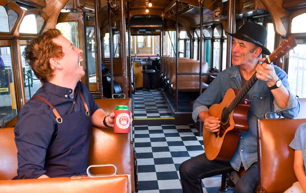 Jacob Amarant and musician Chris DeAraugo on the new Groove Tram. Picture by Noni Hyett