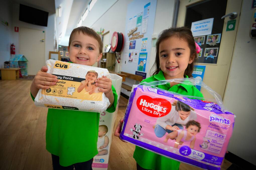 NAPPY: Arlo Clutton and Sienna Tasmoen at one of the Nappy Collective's drop off points. Picture: DARREN HOWE