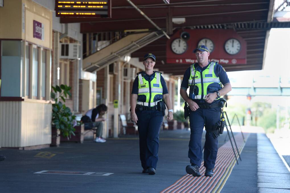 THEY'RE BACK: Protective Services Officers Terry O'Connor and Monica Annal (pictured in 2014) at the Bendigo Railway Station. Picture: JIM ALDERSEY