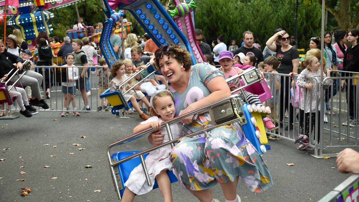 SPINNING: People enjoyed a number of rides and attractions on Mundy Street on Good Friday. Picture: NONI HYETT