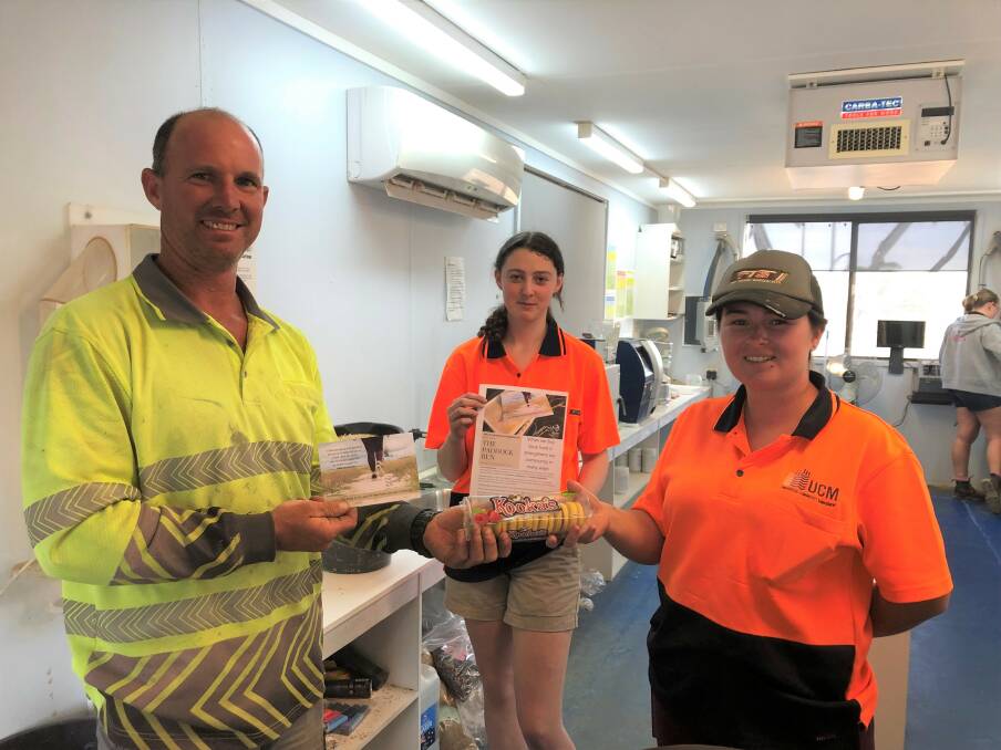 Local farmer Brett Barber was met by UCM testing site staff staff Ebony Frank and Tayla Wyllie, who gave him Kooka's Country Cookies when delivering grain last year. Picture supplied