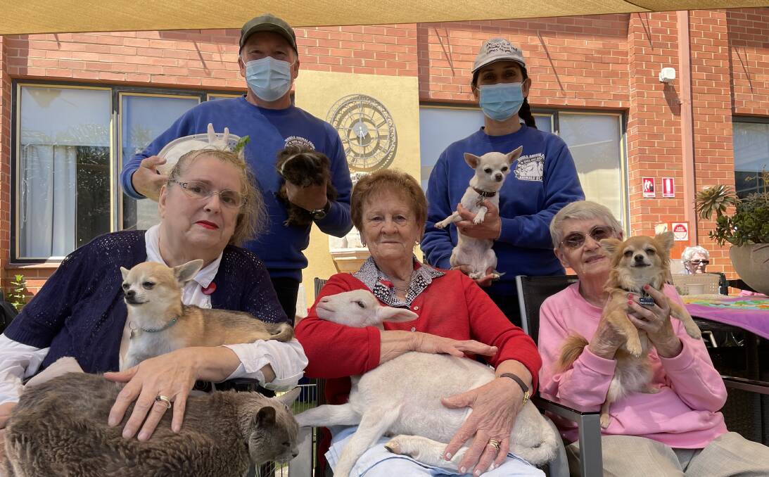 Animals2U owners Jason Peters and Susan Pintos with residents Linda Oataway, Janette Flynn and Val Noble. Picture: ALEX GRETGRIX