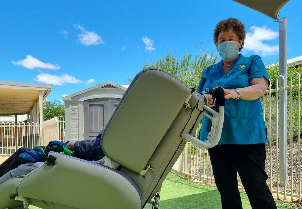 East Wimmera Health Service Wycheproof Campus nurse unit manager Annie Handley with the new chair. Picture: AVERYLL LOFT