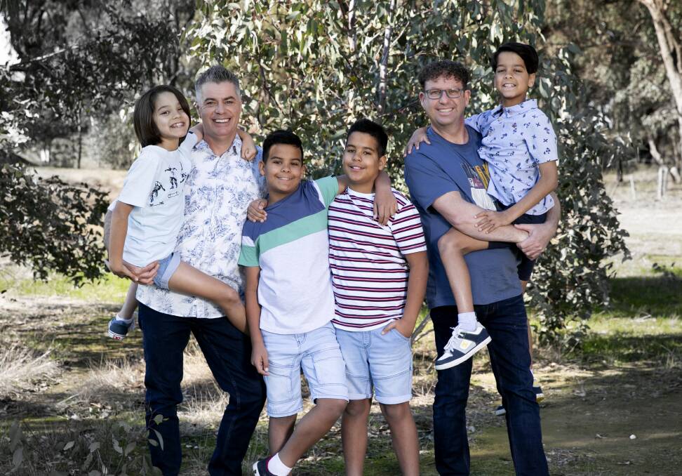 Brett and Tony with their four sons Jagan, Ajay, Gyan and Taz. Picture: SUPPLIED