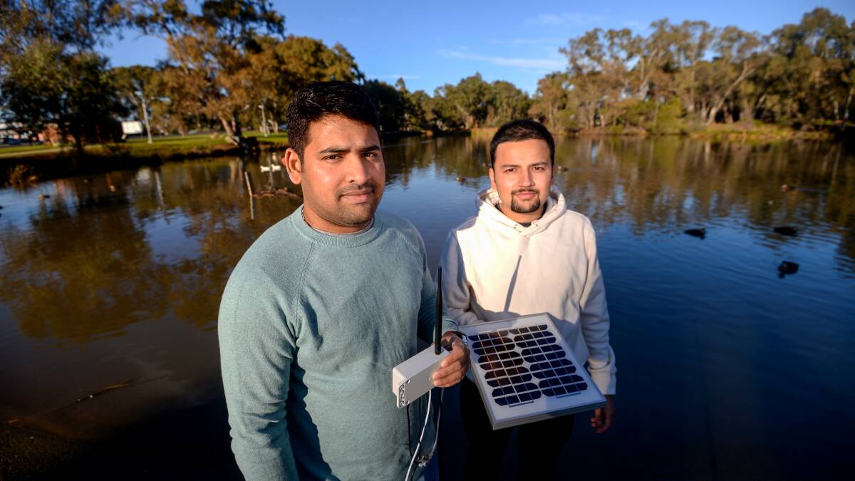La Trobe students Seshandra Sivakumar Kappula and Ayush Mainali are using Internet of Things (IoT) technology to help improve the health of the Bendigo Creek. Picture: DARREN HOWE