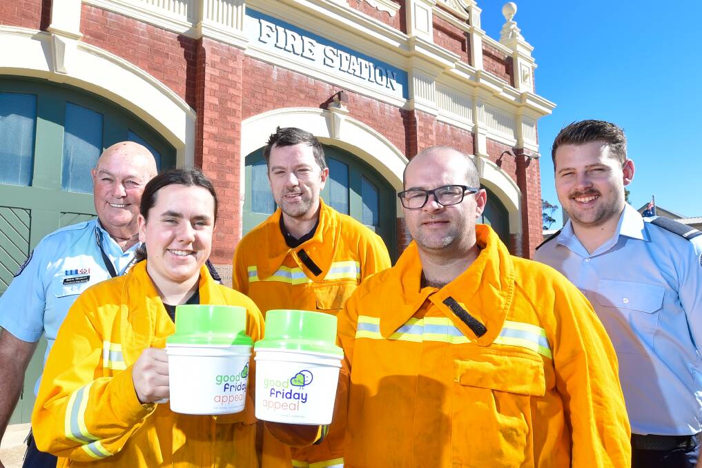 GIVE BACK: Eaglehawk Fire Brigade members will be out in force on Friday collecting money for the Good Friday Appeal. Picture: NONI HYETT