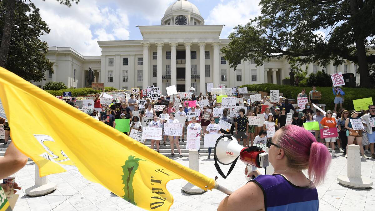 Mia Raven speaks as abortion rights protestors gather on the Alabama Capitol steps during an abortion rights rally and march in Montgomery, Ala., on June 26. PICTURE: Mickey Welsh /AAP Image