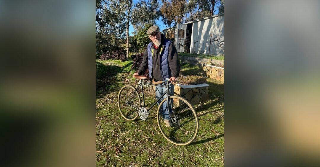 Local bike enthusiast Jim Knight with one of his classic bikes. Picture: SUPPLIED
