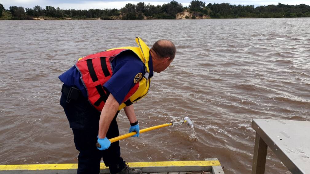 VICSES volunteer Andrew Plant testing water at Orbost and Marlo. Picture supplied