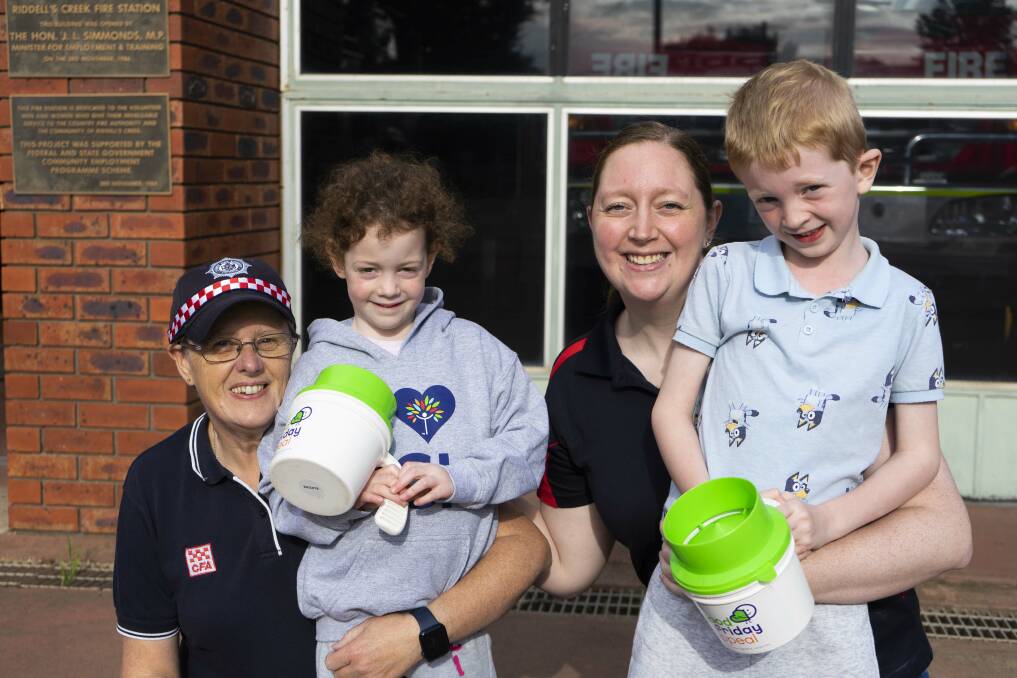 DIG DEEP: Gill Metz and her grandkids with daughter Hattie Amos. Picture: SUPPLIED