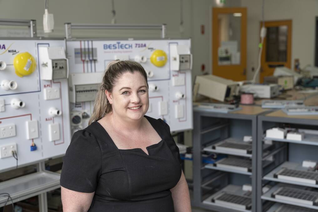 Alex Hopkin loves her new role teaching women about the world of electrical trades. Picture supplied