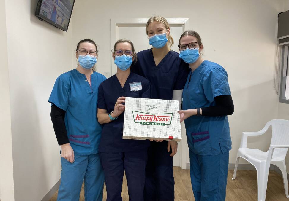Sharee Keuken, Robyn Slot, Genna Ogier and Katie Lacey enjoyed donuts from Dr Harry Little Preschool. Picture: SUPPLIED