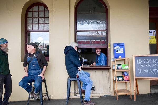The Tortoise Espresso coffee window in Castlemaine, Victoria with customers waiting patiently. Picture by Brendan McCarthy