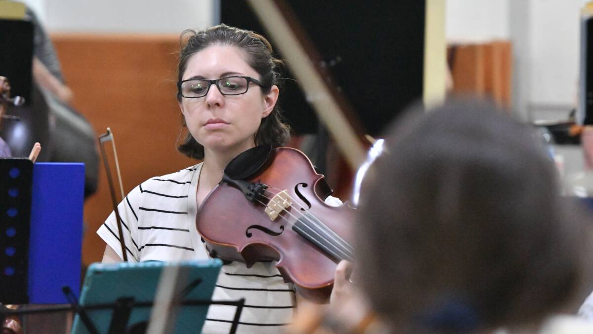 Cally Bartlett in rehearsal with the Bendigo Symphony Orchestra for the gala concerts which will feature the world premiere of her composition 'Kati Thanda-Lake Eyre'. Picture: NONI HYETT