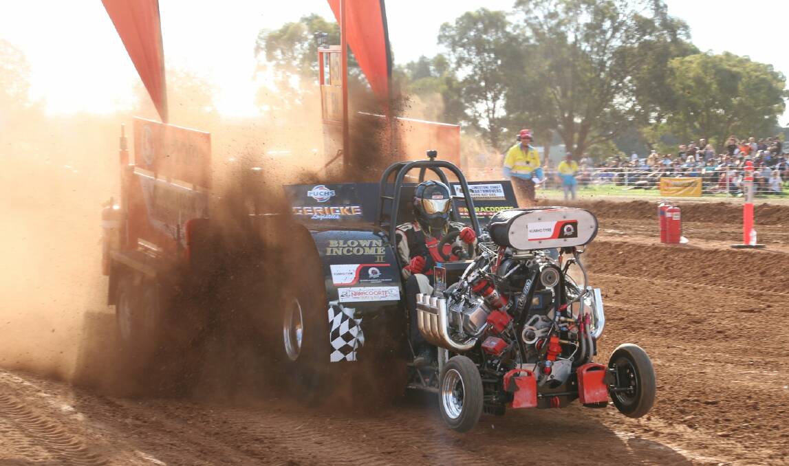 EAT MY DUST: Action from the Elmore Tractor Pull.