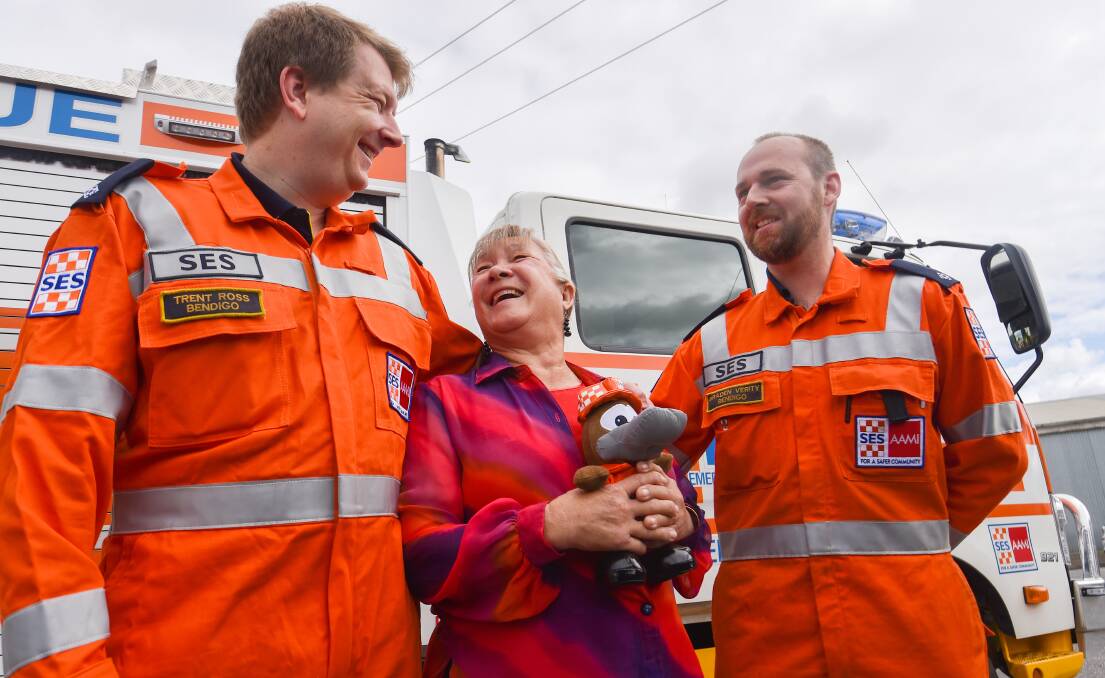 An eternally grateful Marlene Wing-Quay with her SES rescuers Trent Ross and Braden Verity. Picture by DARREN HOWE