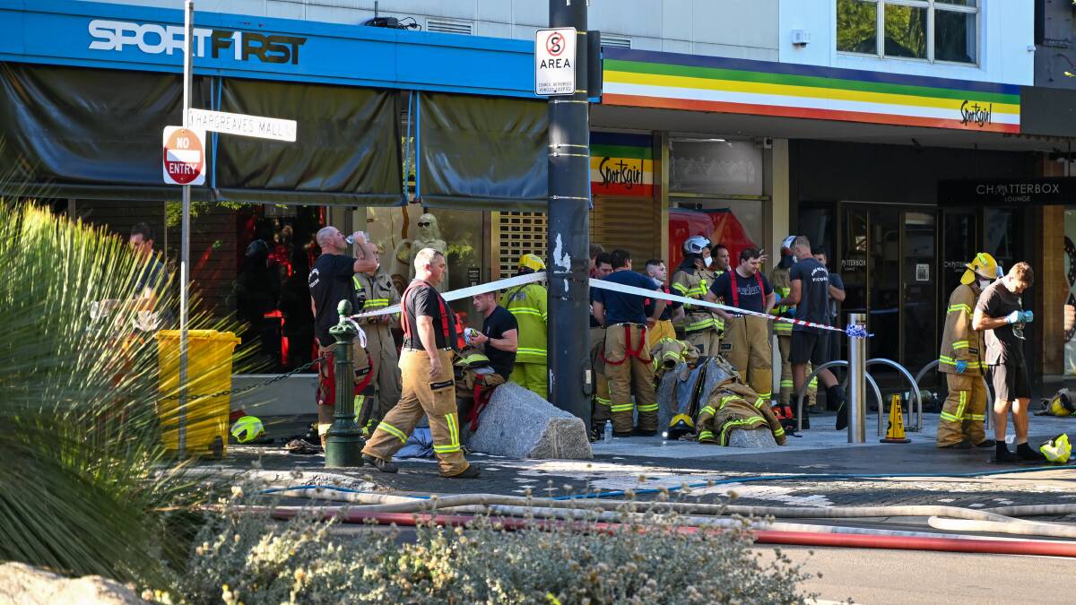 Emergency crews at the scene of the Hargreaves Mall tobacco shop fire. Picture by Enzo Tomasiello