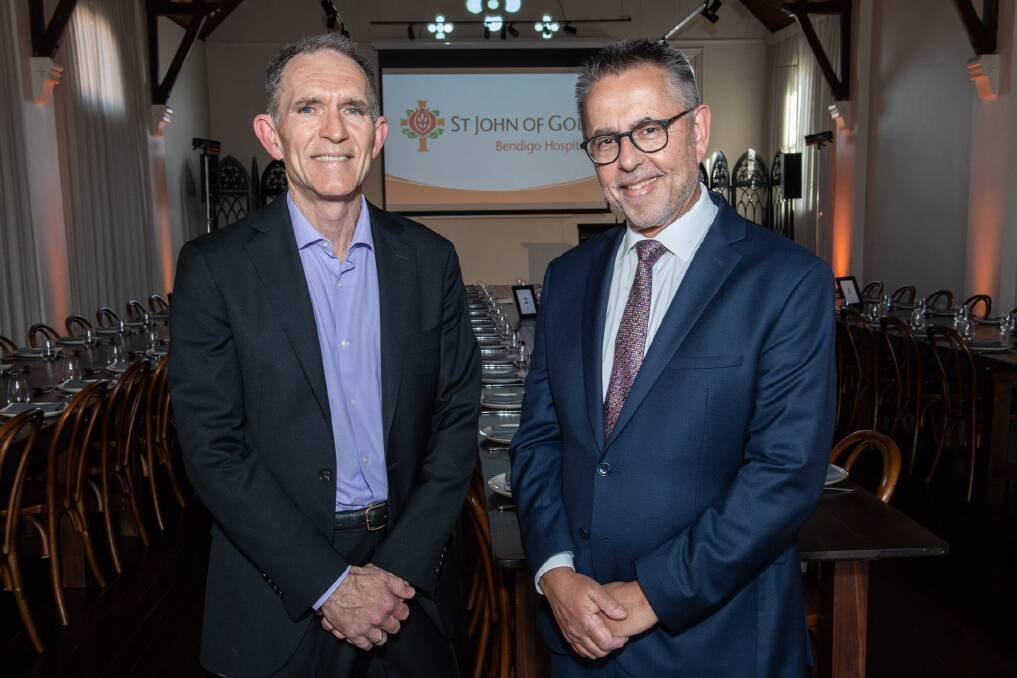 St John of God Hospital Bendigo chief executive Michael Hogan with Dr Norman Swan at Thursday's dinner. Picture supplied