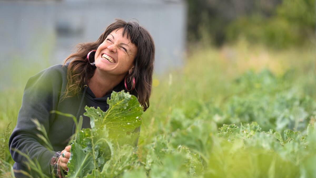Mel Willard is happy at Gunghoe Growers, one of the agribusinesses that ,akes up Harcourt Organic Farming Cooperative (HOFC). Picture: DARREN HOWE
