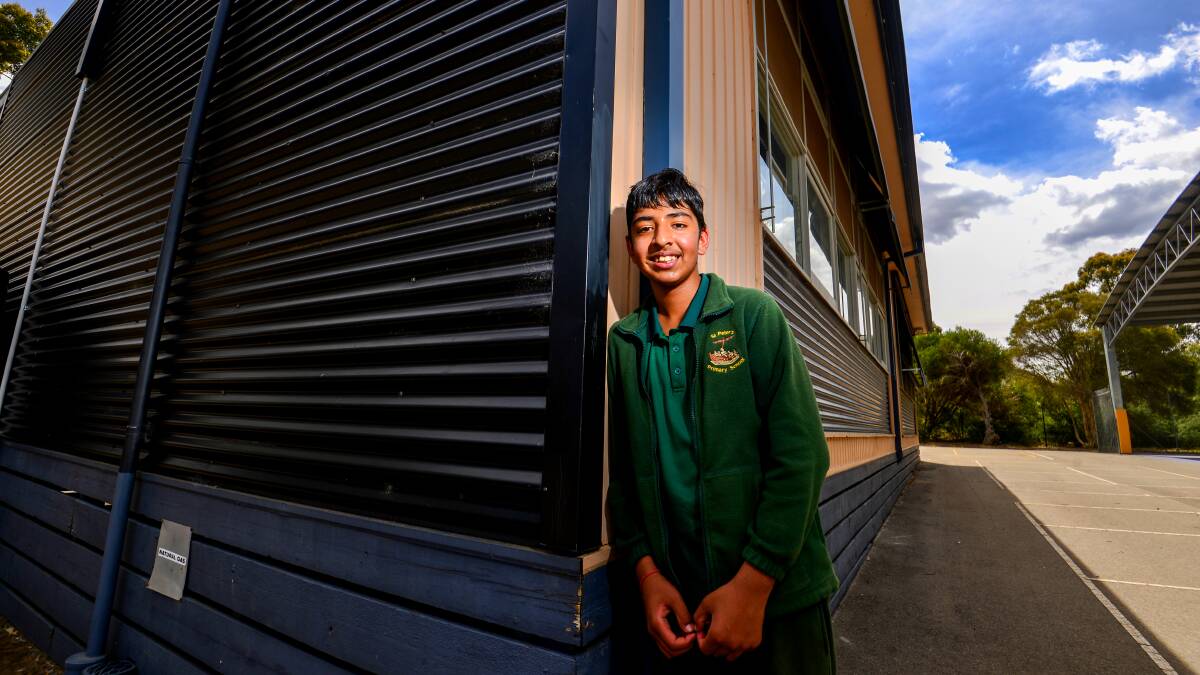 St Peter's Primary School co-captain Kartik Sharma at one of the portable classrooms which will be obsolete after a million-dollar refurbishment next year. Picture: DARREN HOWE