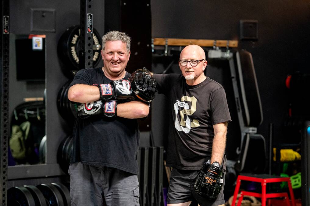 Ben Smith and Bendigo Health peer support worker James Long complete a boxing session at Silverback Gym as part of the Exercise and Wellbeing Program. Picture supplied.