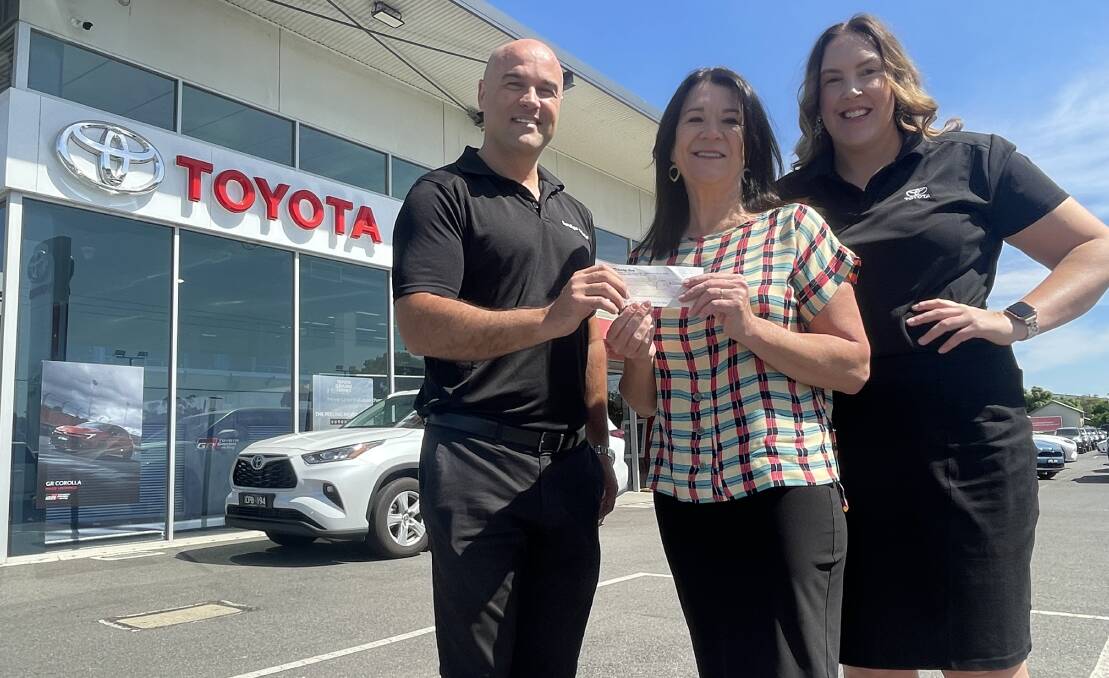 Bendigo Foodshare CEO Michelle Murphy accepts the $40,000 donation from Bendigo Toyota dealer principal Adam Ski and marketing manager Gabrielle Richards. Picture by David Chapman