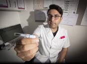 GET VACCINATED: Priceline pharmacist Omar Awan said the flu vaccine is just as important as the COVID-19 vaccine. Photo: Peter Hardin 