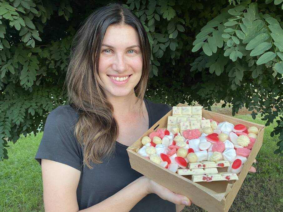 SWEET TREAT: Graze the Board owner Amy Skewes shows off her Valentine's Day grazing box. Photo: Supplied.