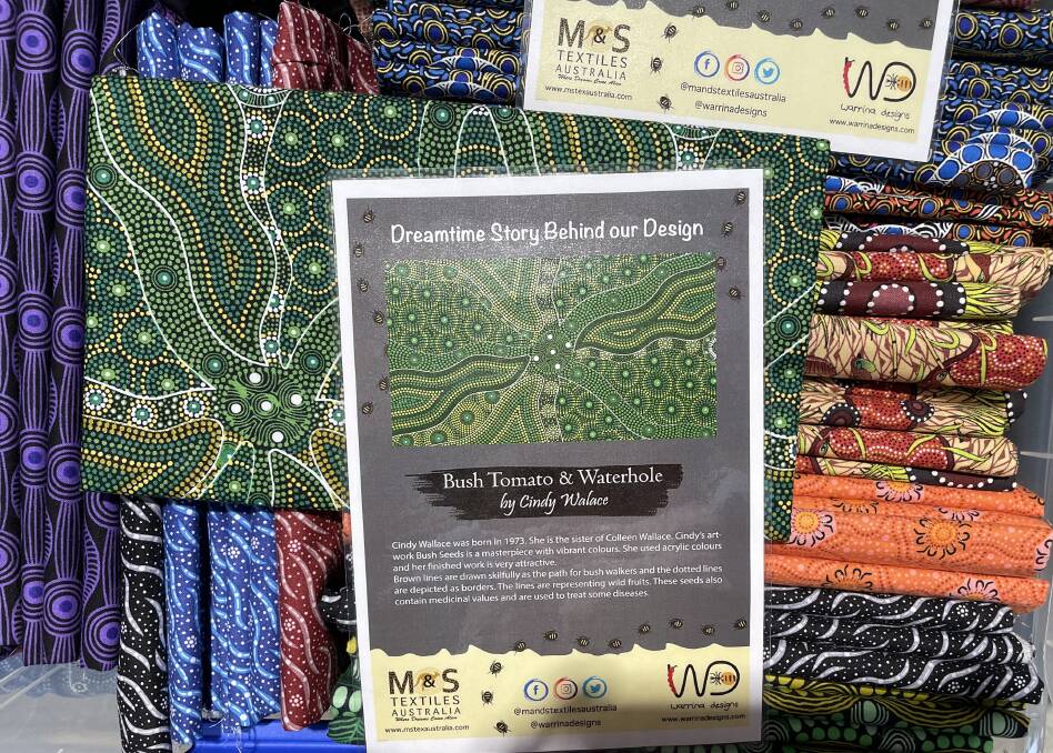 DRAGONFLY STORIES: Aboriginal art fabrics are sold with stories explaining the meaning of the designs. Picture: SUPPLIED 