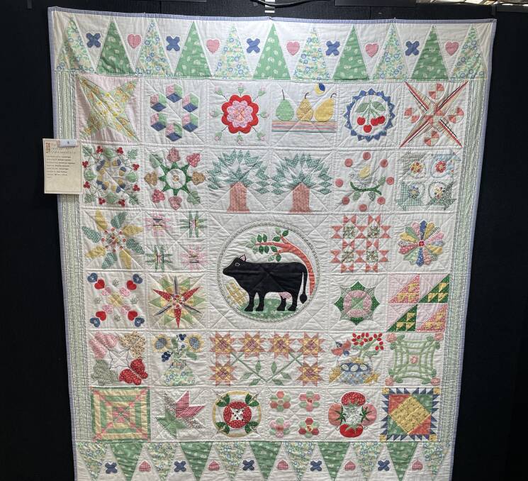 PASTORAL BEAUTY: farm life is celebrated in this quilt by Carole Egan. Picture: JULIEANNE STRACHAN