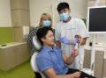 CHECK-UP: Ballarat Health dental operations director Jacqui Nolan with La Trobe University students Christopher Lee and John Do. Picture: Lachlan Bence