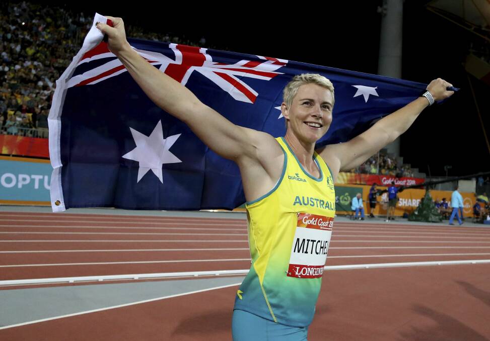 Australia's Kathryn Mitchell celebrates after winning the women's javelin final at Carrara Stadium during the 2018 Commonwealth Games at the Gold Coast, Australia, Wednesday, April 11, 2018. Picture: AP/Dita Alangkara.