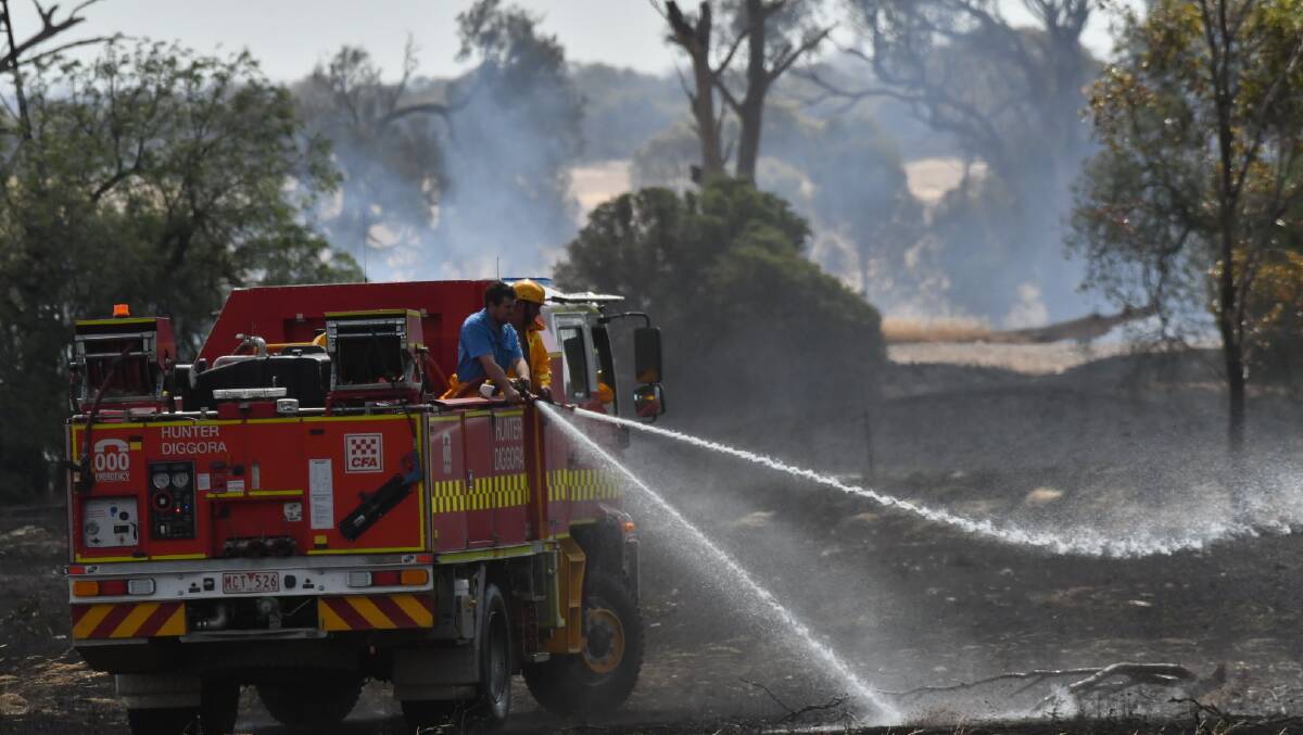A grassfire burns in Kamarooka. Picture: NONI HYETT