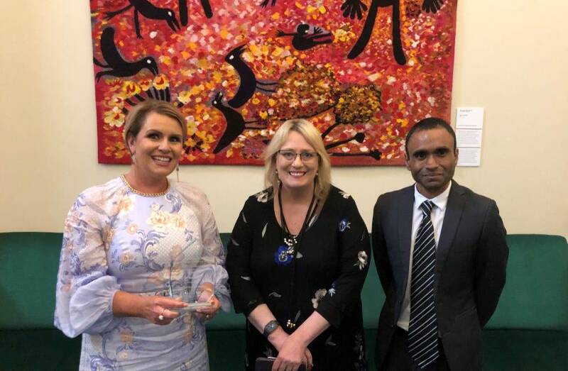 Kangan Institute CEO Sally Curtain, Victorian multicultural affairs minister Ros Spence, and Kangan Institute's Hemant Kokularupan. Picture: SUPPLIED 