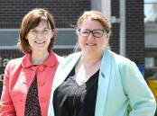 BOOST: Mary-Anne Thomas (left) with corrections minister Natalie Hutchins. Picture: NONI HYETT
