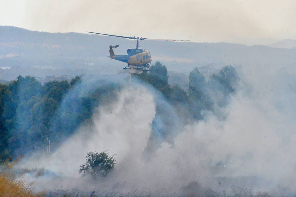 SUPPORT: The Harcourt blaze was brought under control with the help of air support. Picture: DARREN HOWE