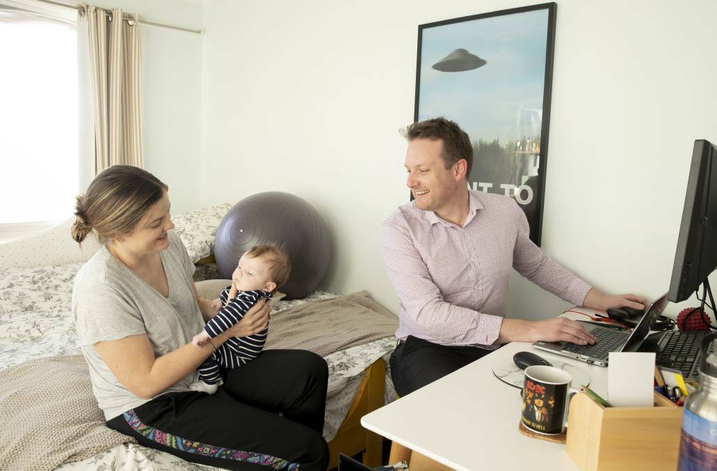 Public servant Miles Davis balances working from home with raising Morgan with his wife Sophie. Picture: Sitthixay Ditthavong