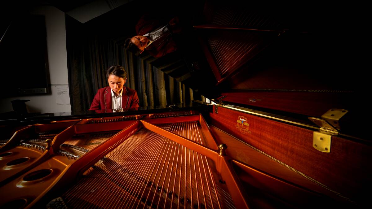 YOUNG piano star, Augustine Leung, in his natural element. PICTURE: Darren Howe