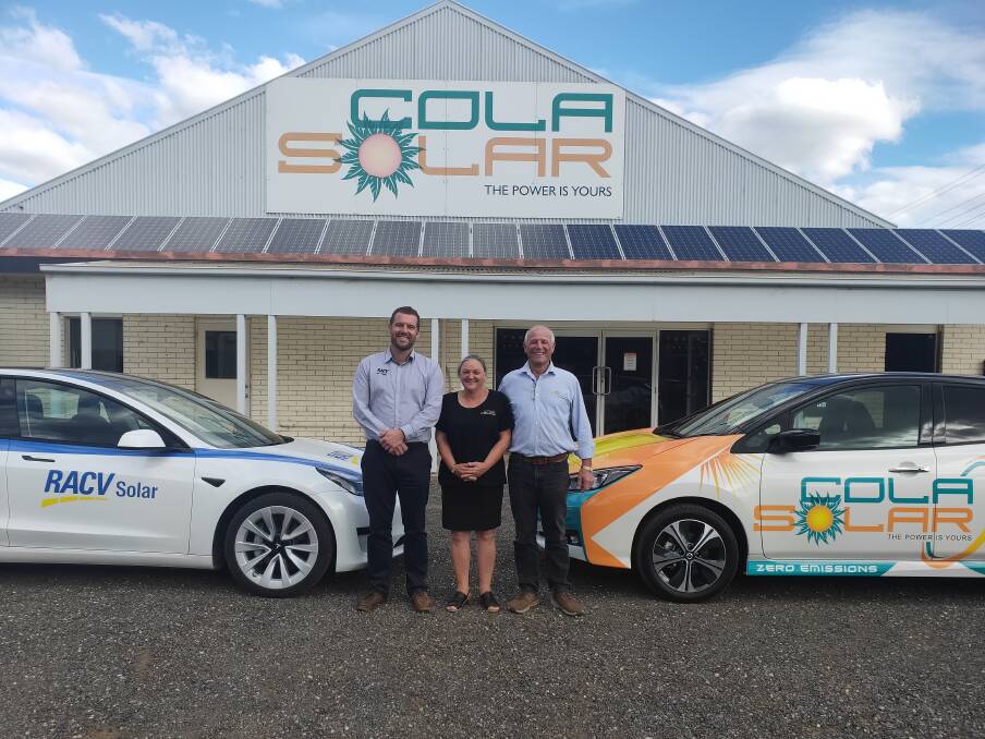 IT'S A DEAL: RACV Solar CEO Andy McCarthy with Kaye Ruff and Tony Ruff outside Colar Solar. Picture: Supplied.