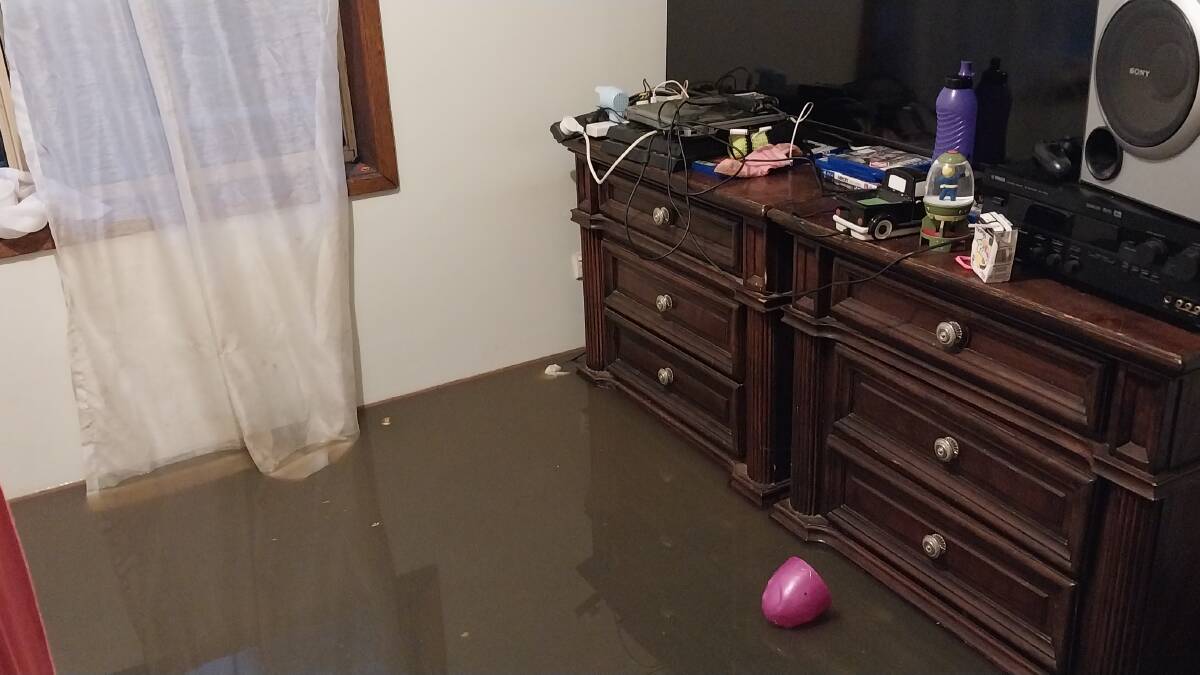 Water filling Rob Carnegie's Rochester bedroom before he was evacuated in November. Picture supplied