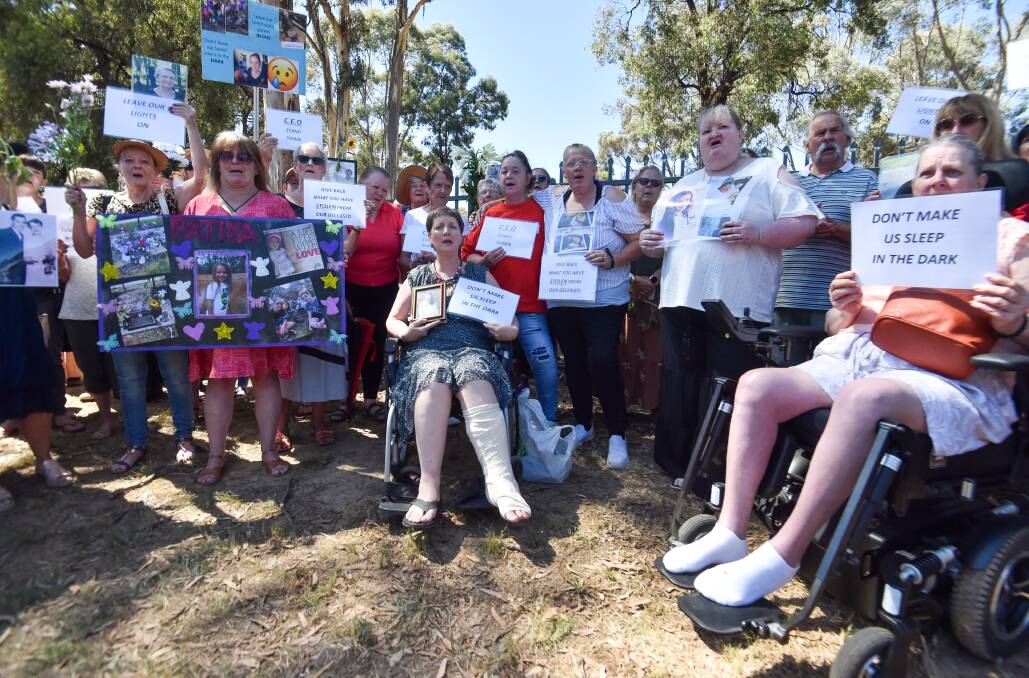 A January 31 protest at Eaglehawk cemetery about the removal of flowers and other items from loved ones' graves. Picture by Darren Howe
