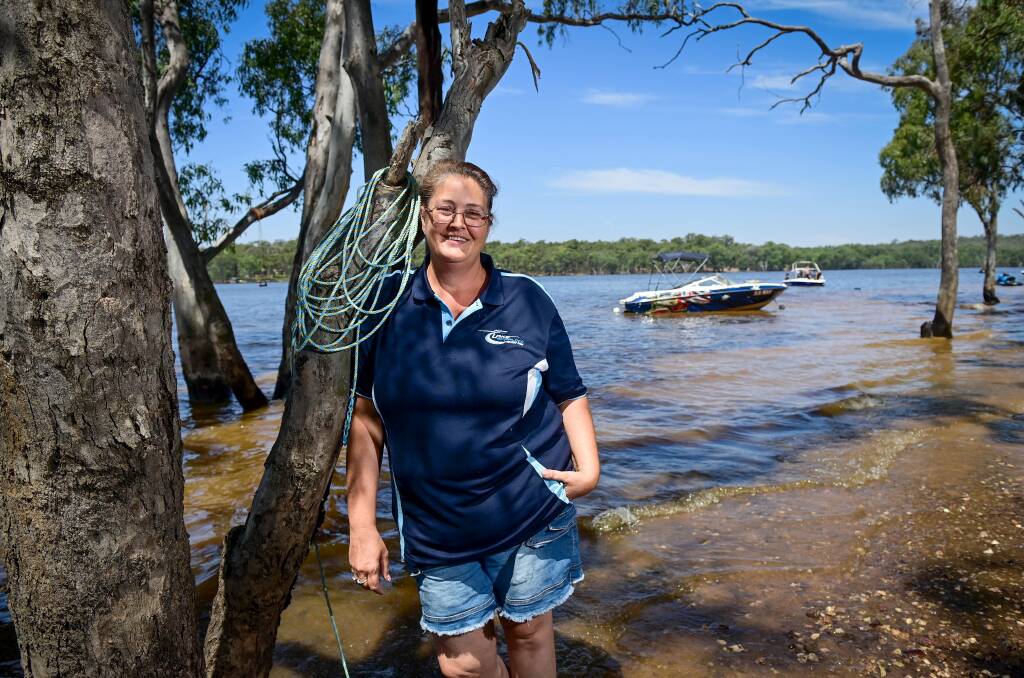 Assistant manager Sandy Jager in her favourite spot by the water at Lake Eppalock Holiday Park. Pictures by Brendan McCarthy