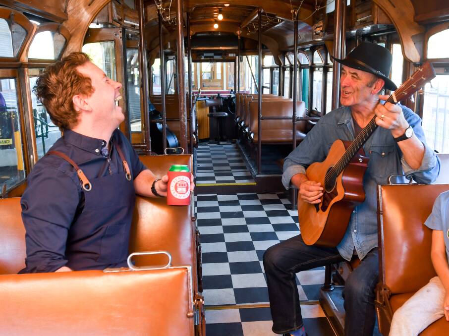 Jacob Amarant and musician Chris DeAraugo on the Groove Tram last year. Picture by Noni Hyett