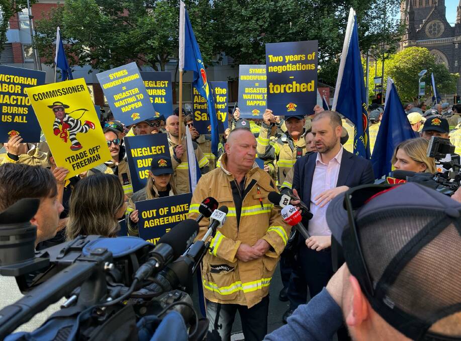United Firefighters Union boss Peter Marshall addresses the media at the protest on Thursday. Picture by UFU Victoria