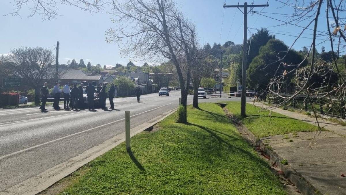 More than a dozen police at the corner of Bridport and Albert streets, Daylesford, near where a now-deceased man was found badly injured at dawn. Picture supplied to The Ballarat Courier. 