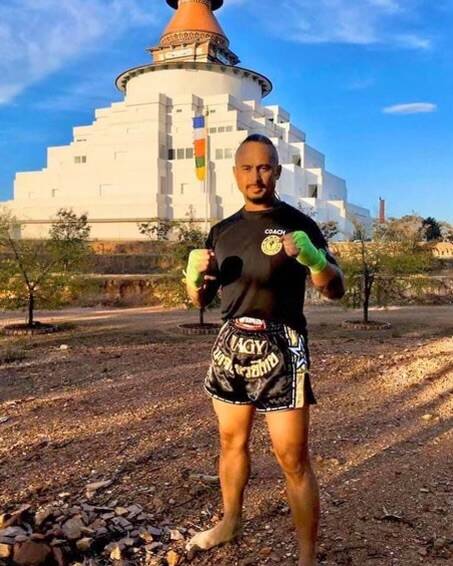 Muay Thai instructor Richard Nagy by the Great Stupa. Picture supplied.