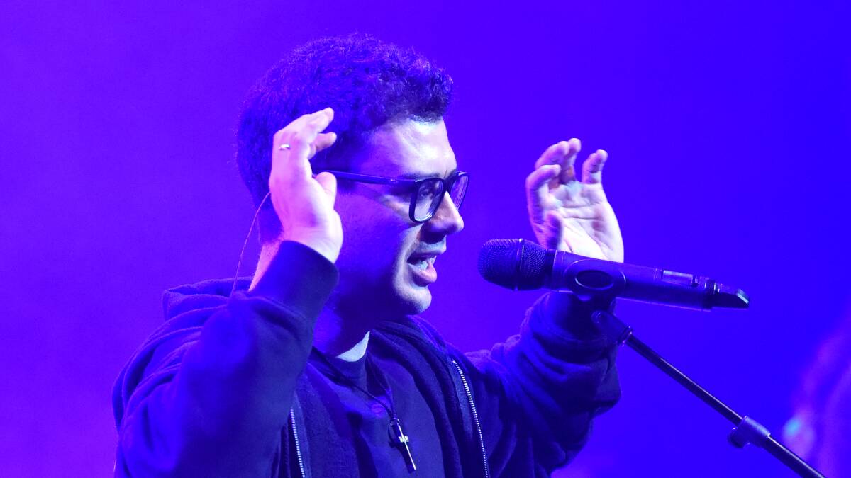 MINISTRY: Fr Rob Galea has travelled the world spreading the message of faith through his music. Picture: DARREN HOWE 