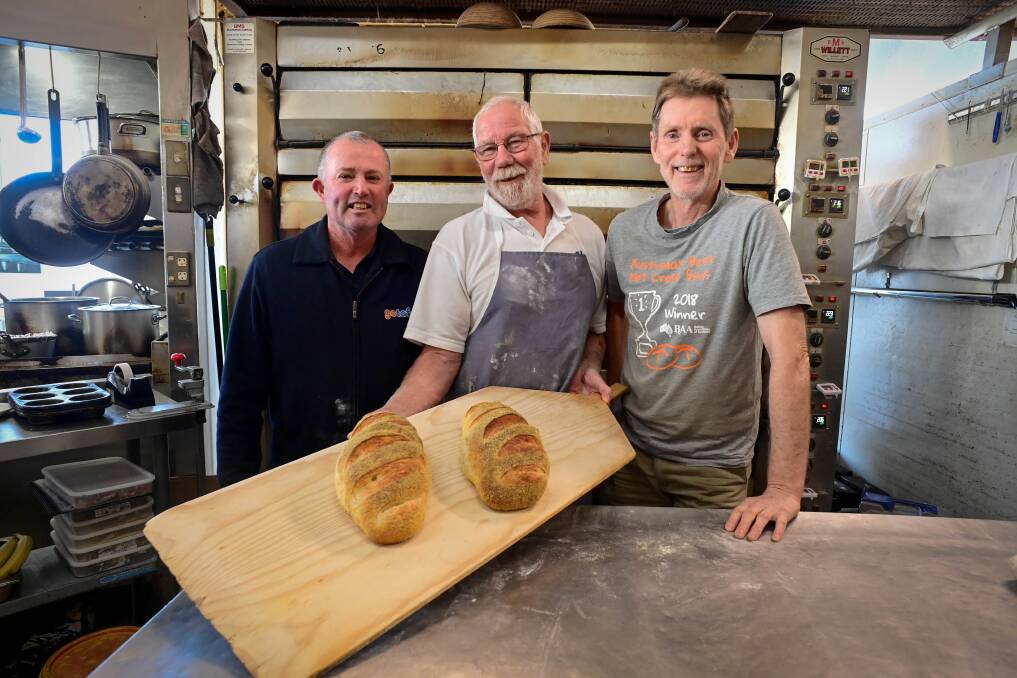 FRESH APPRENTICE: TAFE Bakery Trainer Kim Banfield, recent graduate Dave Clarke and Laurie Whelan of Bendigo's The Good Loaf are ready to celebrate Mr Clarke's achievement. Picture: BRENDAN MCCARTHY 